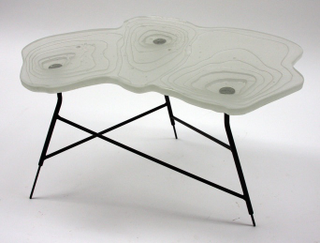 Illustration for article titled Topographic Tables Mix Geology With Interior Design